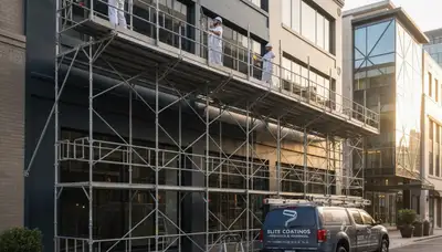 Professional commercial painters working on exterior building in Stockton, CA