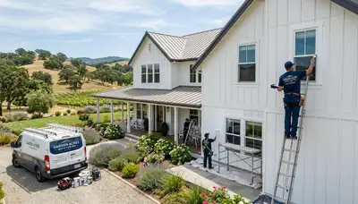 Professional house painters working on residential exterior in Stockton, CA