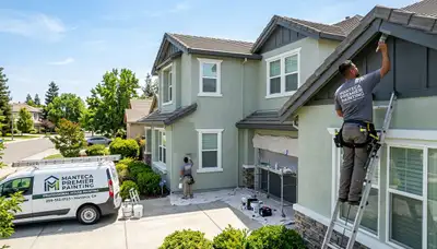Professional house painters working on residential exterior in Stockton, CA