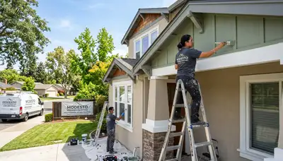 Professional house painters enhancing home exterior in Stockton, CA
